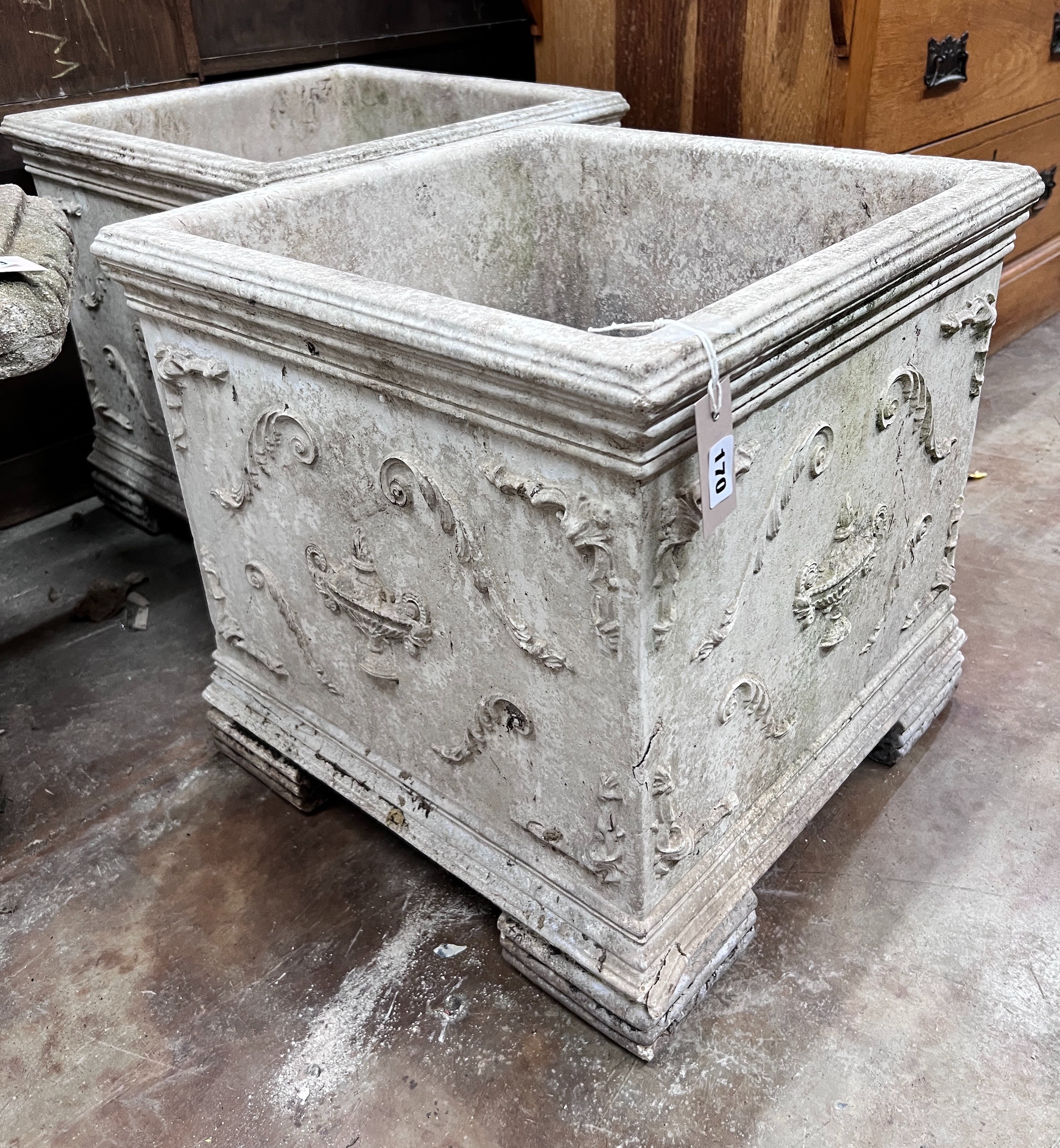 A pair of reconstituted stone square garden planters, width 48cm, height 47cm *Please note the sale commences at 9am.